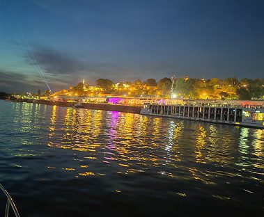 Panoramic night view of illuminated Belgrade Fortress and Old Town skyline from Sava river during a 3-hour private cruise